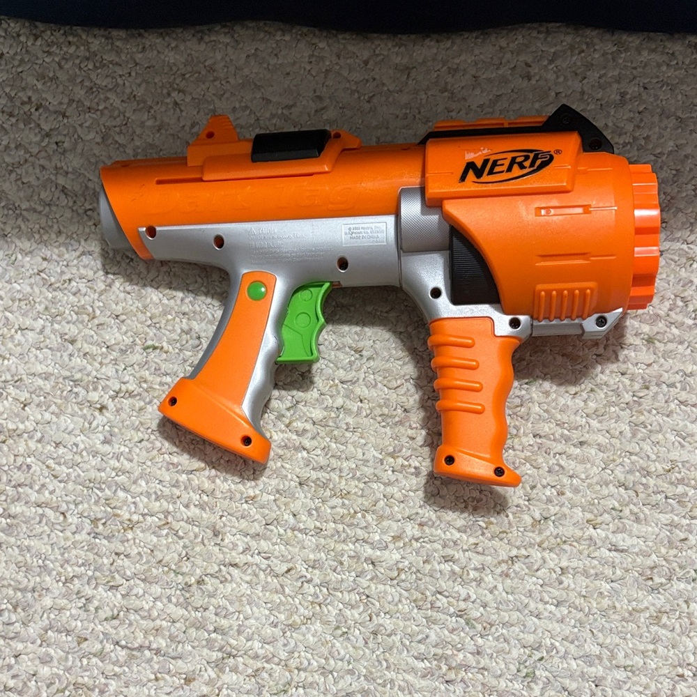 Nerf Blaster in Orange, Silver, and Green